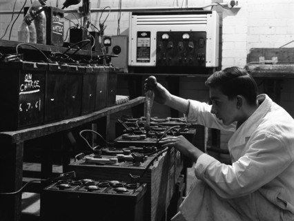A young apprentice at Globe & Simpson auto electricians workshop, Lincoln, Lincolnshire, 1961. Artist: Michael Walters