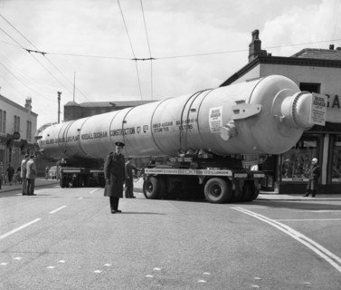 A heavy load stops the Manchester traffic, 1962.  Artist: Michael Walters