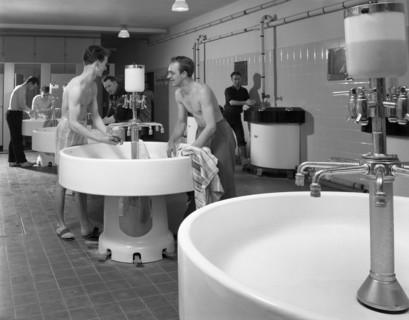 Workers in the washroom facility at a steelworks, Rotherham, South Yorkshire, 1964. Artist: Michael Walters