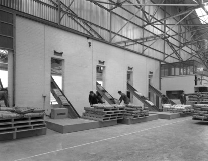 Loading animal feed onto conveyors, Spillers Animal Feeds, Gainsborough, Linconshire, 1961. Artist: Michael Walters