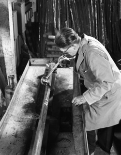 Crack detection on steel bars at J Beardshaw & Sons, Sheffield, South Yorkshire, 1963.  Artist: Michael Walters