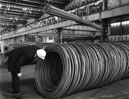 Coils and hexagonal bars at the Park Gate Iron & Steel Co, Rotherham, South Yorkshire, 1964. Artist: Michael Walters
