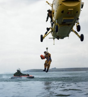Westland Whirlwind helicopter making a rescue, 1973. Artist: Michael Walters