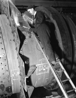 Welding an industrial drying unit, Edgar Allen Steel Co, Sheffield, South Yorkshire, 1962. Artist: Michael Walters
