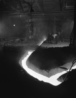 Molten steel being channelled at the Stanton Steel Works, Ilkeston, Derbyshire, 1962.  Artist: Michael Walters