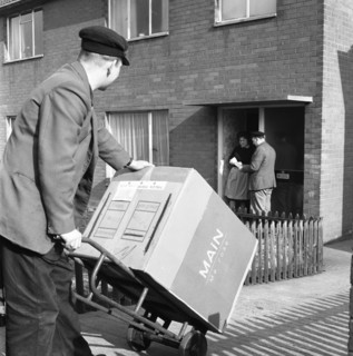 Home delivery of a cooker, Darfield, Barnsley, South Yorkshire, 1963. Artist: Michael Walters