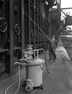 Spraying the ovens at Manvers coking works near Rotherham, South Yorkshire, 1963. Artist: Michael Walters