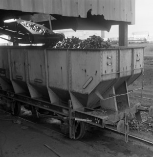 A rail truck being loaded with coal, Lynemouth Colliery, Northumberland, 1963. Artist: Michael Walters