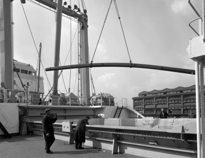 Steel bars being loaded onto the 'Manchester Renown', Manchester, 1964. Artist: Michael Walters