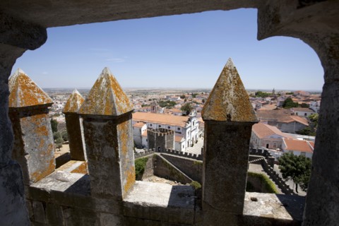 Merlons on the battlements of Beja Castle and view of the city, Beja, Portugal, 2009. Artist: Samuel Magal