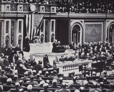 President Wilson in Congress recommending the US enter the war against Germany, 1917. Artist: Unknown