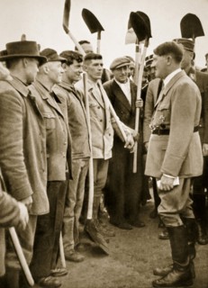 Adolf Hitler chatting to road workers, 1936 Artist: Unknown