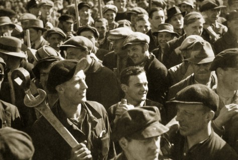Factory workers with their tools celebrate the traditional Socialist holiday, Germany, 1936. Artist: Unknown