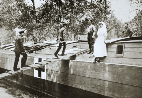 Patients being taken on board a hospital barge, Somme campaign, France, World War I, 1916. Artist: Unknown
