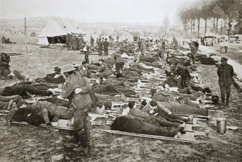 Wounded men waiting to be taken away to a clearing station, France, World War I, 1916. Artist: Unknown