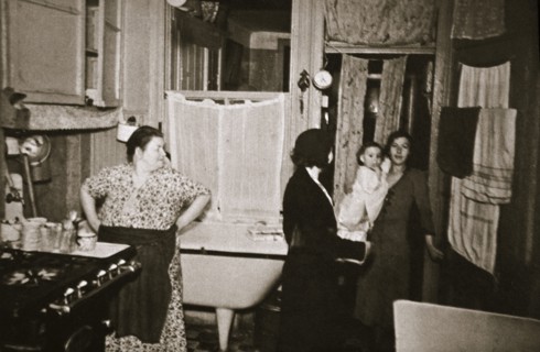 Residents of a tenement, Henry Street, Lower East Side, Manhattan, New York, USA, early 1930s. Artist: Unknown