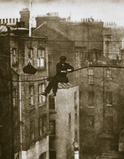 Inspecting a telephone cable between Conduit and Maddox Streets, 20th century. Artist: Unknown