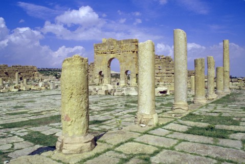 Antonine Gate and ruined pillars, Sbeitla, Tunisia.