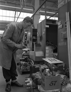Warehouseman checking stock in the stores at Bestwood Colliery, North Nottinghamshire, 1962. Artist: Michael Walters