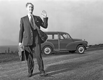 Waving Sales rep with a Moris Minor Shooting Brake, 3rd Aug 1963. Artist: Michael Walters