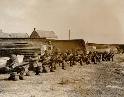 Holy Island fishermen Home Guards rifle practice, Lindisfarne, Northumberland, World War II, 1942. Artist: Unknown