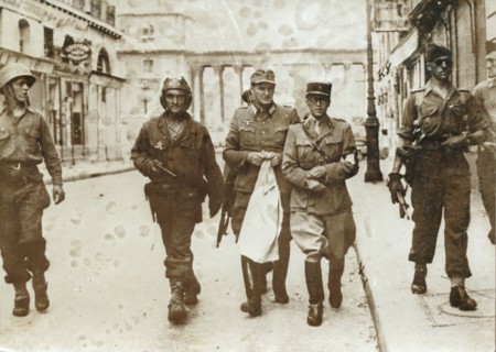 A German officer escorted by French soldiers, the liberation of Paris, World War II, 1944. Artist: Unknown
