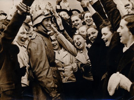 German motorized troops are greeted on their arrival in Vienna, Austria, 1938. Artist: Unknown