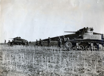 British troops supported by American tanks advance on the Tunisian front, December 1942. Artist: Unknown