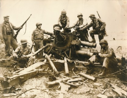 American troops looking for souvenir near Cherbourg airport, July 1944. Artist: Unknown