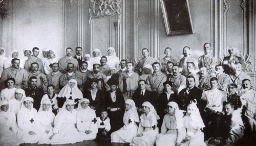 Tsarina Maria Fyodorovna of Russia visiting a hospital in Kiev, 1915. Artist: Unknown