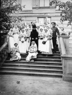 Dowager Empress Maria Feodorovna of Russia with nurses outside a hospital, Russia, 1916. Artist: Unknown