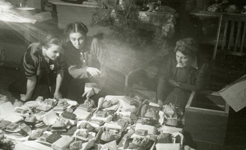 Actresses of the Moscow Art Theatre preparing presents for the Red Army, USSR, 1943. Artist: Anon