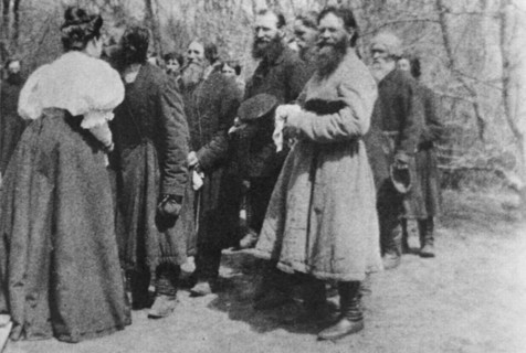 Landowner giving the Paschal greeting to her peasants, Russia, 1890s. Artist: Unknown