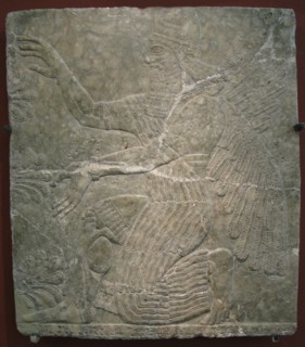 Winged deity by the sacred tree. Relief from the palace of Ashurnasirpal II at Kalhu, Nimrud, 9th century BC. Artist: Assyrian Art
