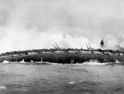 The german armoured cruiser SMS Blücher sinks after receiving multiple hits from British warships at Artist: Anonymous