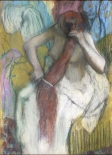 Woman Combing Her Hair. Artist: Degas, Edgar (1834-1917)
