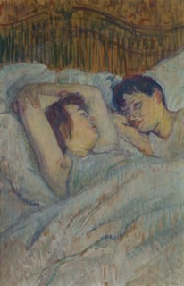 In the bed.