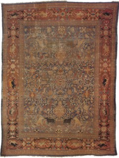 Amida carpet depicting the emblem of Emir: lion attacking bull.