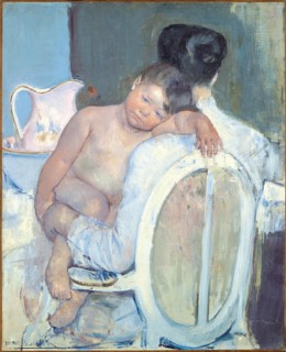 Woman Sitting with a Child in Her Arms.