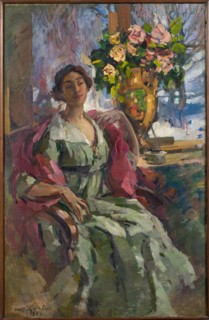 Woman with bouquet of roses, 1921.