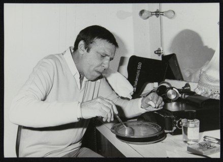 Buddy Rich eating backstage at Ronnie Scott's Jazz Club, London, 1979. Artist: Denis Williams