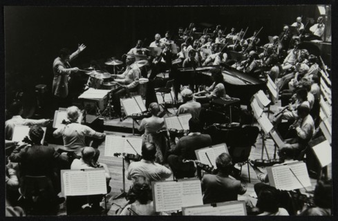 Buddy Rich and the Royal Philharmonic Orchestra in concert at the Royal Festival Hall, London, 1985. Artist: Denis Williams