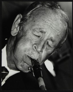 Spike Robinson playing tenor saxophone at The Fairway, Welwyn Garden City, Hertfordshire, 1992. Artist: Denis Williams