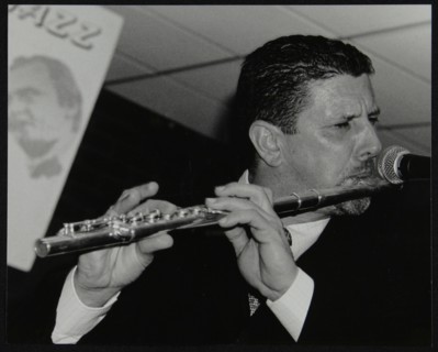 Benn Clatworthy playing the flute at The Fairway, Welwyn Garden City, Hertfordshire, 2002. Artist: Denis Williams