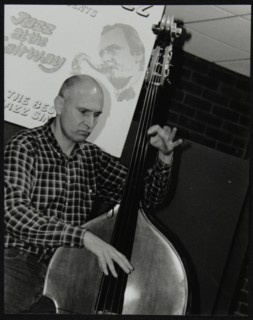 Bassist Simon Woolf playing at The Fairway, Welwyn Garden City, Hertfordshire, 2002. Artist: Denis Williams