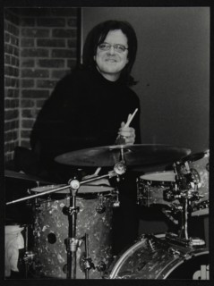 Drummer Pete Cater at The Fairway, Welwyn Garden City, Hertfordshire, 15 December 2002. Artist: Denis Williams