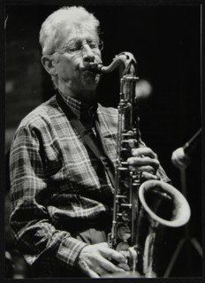 Phil Day playing tenor saxophone at The Fairway, Welwyn Garden City, Hertfordshire, 19 October 2003. Artist: Denis Williams
