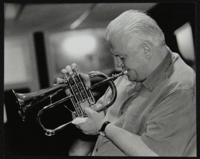 Bruce Adams playing the flugelhorn at The Fairway, Welwyn Garden City, Hertfordshire, 2 June 2002. Artist: Denis Williams