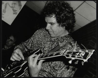Guitarist John Etheridge playing at The Fairway, Welwyn Garden City, Hertfordshire, 9 November 2003. Artist: Denis Williams