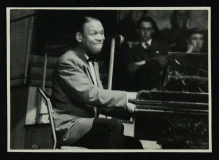 Earl 'Fatha' Hines at the piano, 1950s. Artist: Denis Williams